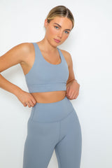 inite sports bra in sky