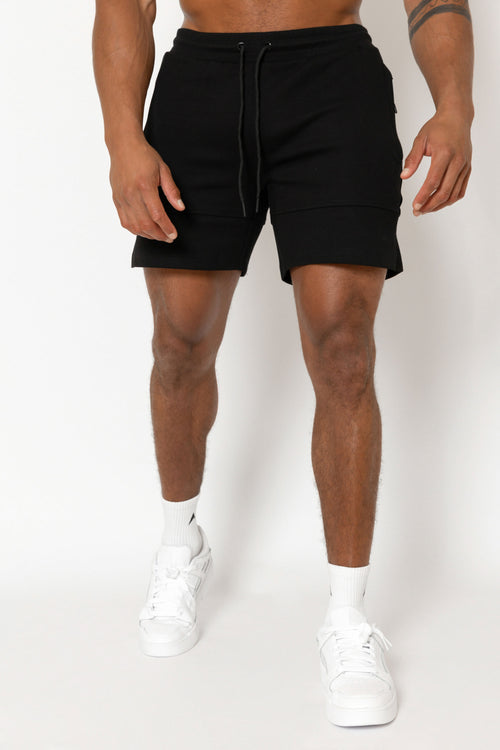 inite trackie shorts in overcast